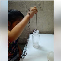 Could you lift an ice cube with a string?? Here U Kg B students are showing how to lift it…