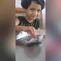 LKG A paper boat sailing activity photos