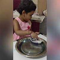 LKG A paper boat sailing activity photos