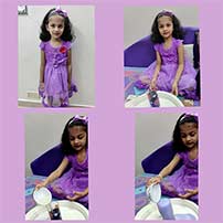 Lkg A children enjoyed the purple bubbles experiment.