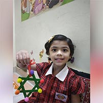 LKG A children prepared a beautiful star shape